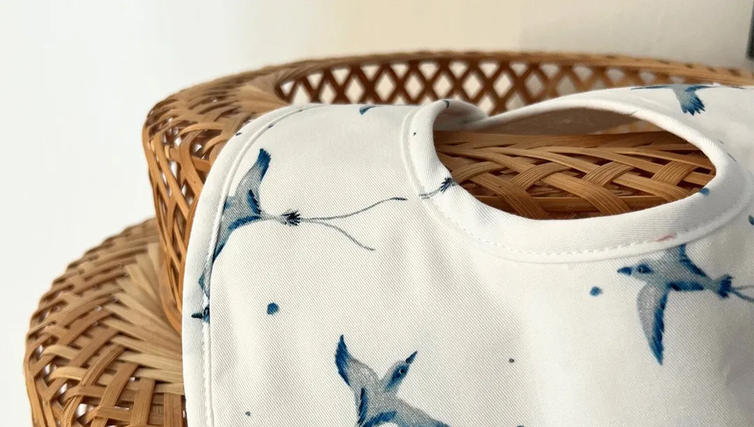 Bavoir paille en queue